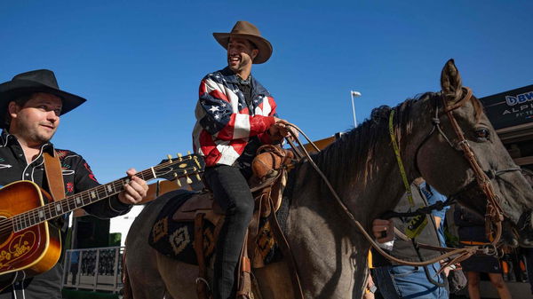 Daniel Ricciardo on a horse