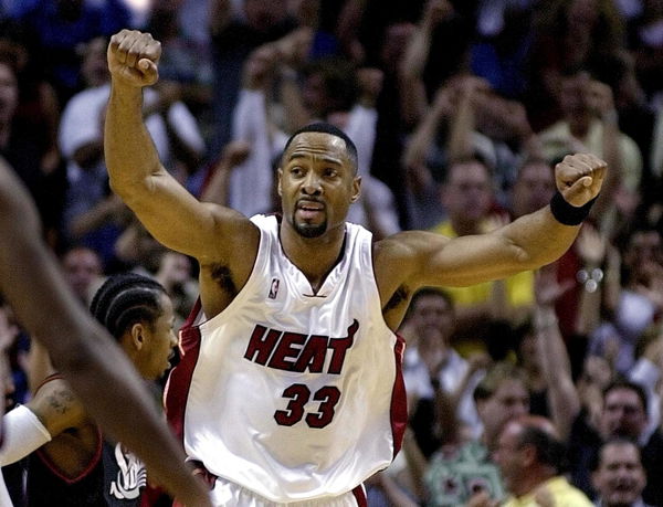 Miami Heat Alonzo Mourning reacts to making the ty