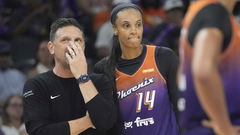 Phoenix Mercury head coach Nate Tibbetts talks with forward DeWanna Bonner (14) during the fourth quarter against the Minnesota Lynx at PHX Arena on July 9, 2025