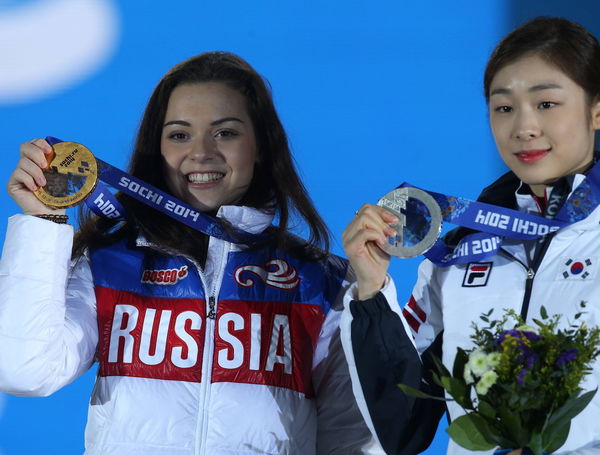 ITAR TASS RUSSIA FEBRUARY 21 2014 Gold medallist Russia s Adelina Sotnikova L and silver med