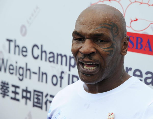 BEIJING CHINA MAY 24 CHINA OUT American former professional boxer Mike Tyson poses on the Grea