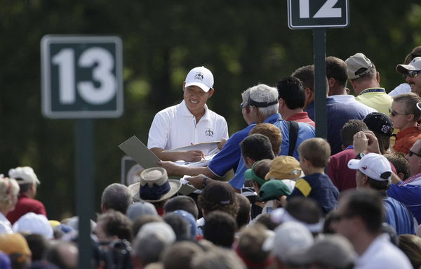 Ryder Cup rookie, Anthony Kim signed autographs between holes during the practice round for the Ryde