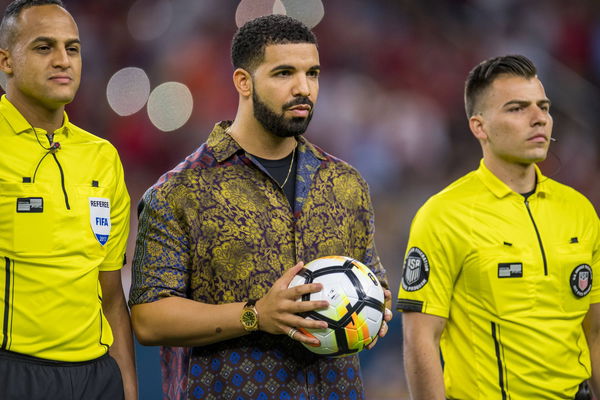 July 20, 2017: Rapper/singer/songwriter Drake delivers the game ball prior to the International Cham