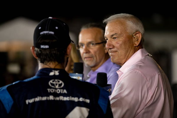SPARTA KY JULY 14 Dale Jarrett NBCSN tv host listens to Martin Truex Jr driver of the 78 Au