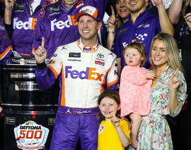 Denny Hamlin with girl friend Jordan Fish and their 2 daughters Taylor 4 and Molly 1 in Victory