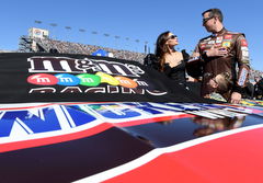 LAS VEGAS, NV &#8211; FEBRUARY 23: Kyle Busch (18) Joe Gibbs Racing (JGR) Toyota Camry stands with his wife Samantha and son B