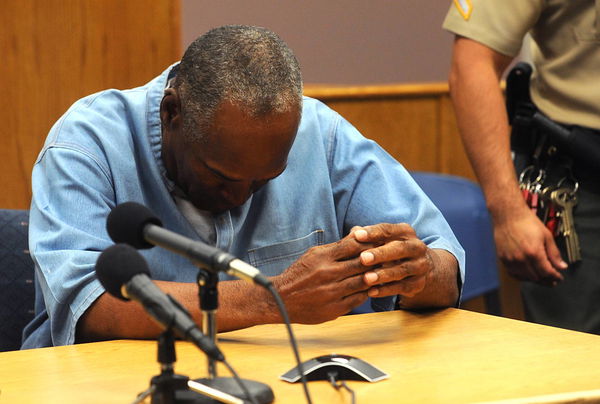 O J Simpson reacts after learning he was granted parole at Lovelock Correctional Center in Lovelock