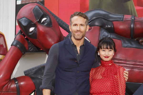 L to R Canadian actor Ryan Reynolds and Japanese actress Shiori Kutsuna pose for the cameras duri