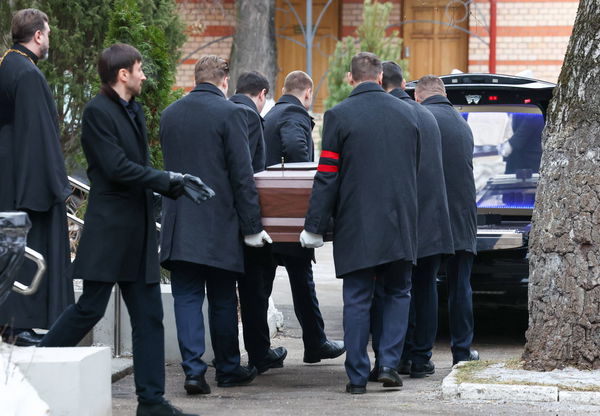 RUSSIA, MOSCOW &#8211; JANUARY 22, 2023: People carry a coffin with the body of Russian film director Nikolai Dostal after a m