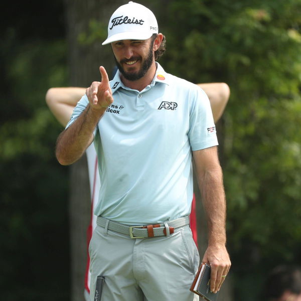 Syndication: Detroit Free Press Max Homa lines up his putt using the AimPoint technique on the ninth green during the Ro