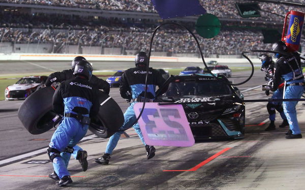 Syndication: Daytona Beach News-Journal The pit crew jumps into action as Bubba Wallace brings the no. 23 Toyota in for