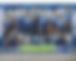 Mural in downtown Dallas with Dallas Mavericks basketball players, 2020., Pictured is a mural in downtown Dallas with Dallas Mavericks basketball players on the 2019-2020 roster. In this portion from left to right at top are Courtney Lee, Isaiah Roby, Dwight Powell, Delon Wright, Kristaps Porzingis, Luca Doncic, Justin Jackson, J. J. Barea, and Boban Marjonavic. Bottom left crouching is Seth Curry, and bottm right crouching is Jalen Brunson.