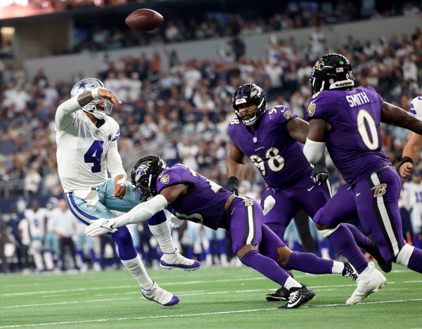 SPORTS-FBN-ENGEL-COLUMN-FT Dallas Cowboys quarterback Dak Prescott releases the ball while under pressure from the Balti