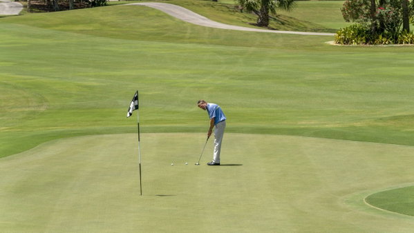 April 28, 2020, Jupiter, Florida, USA: Golf course superintendent Dale Knefely tries out the pin placement and tests the