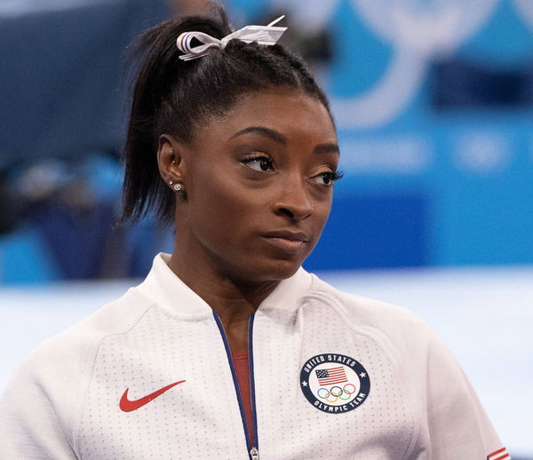 July 27, 2021, Tokyo, Kanto, Japan: Simone Biles of the United States, center, waits to compete in the Women s All Aroun