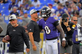 August 16, 2021: Baltimore Ravens head coach John Harbaugh with quarterback Lamar Jackson during the first preseason gam