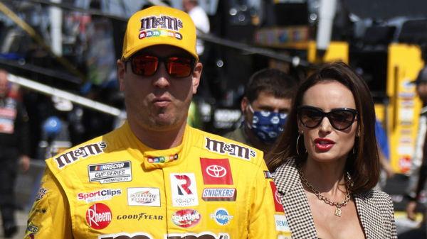 TALLADEGA, AL &#8211; OCTOBER 04: 18: Kyle Busch, Joe Gibbs Racing, Toyota Camry M&amp;M s with wife Samantha during the running o