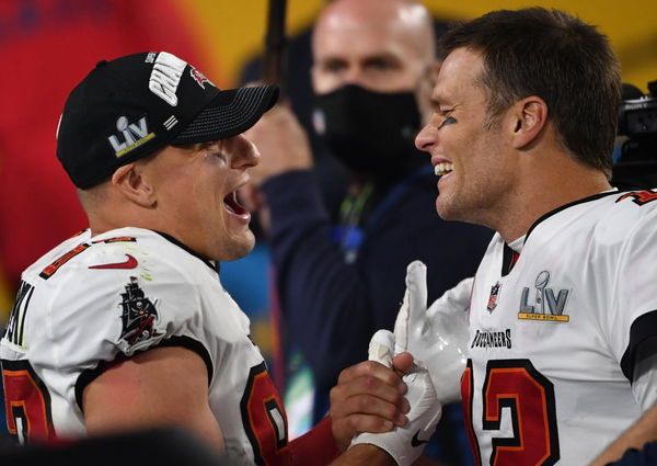 Tampa Bay Buccaneers quarterback Tom Brady (12) celebrates with teammate Rob Gronkowski after the Buccaneers defeated th