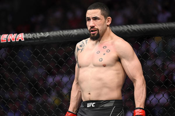 MMA: UFC Fight Night-Whittaker vs Vettori, Sep 3, 2022; Paris, FRANCE; Robert Whittaker (red gloves) before his fight ag