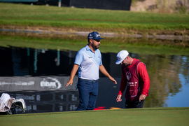 LAS VEGAS, NV &#8211; OCTOBER 06: JJ Spaun speaks to an official regarding his ball in the water hazard on the 17th hole durin
