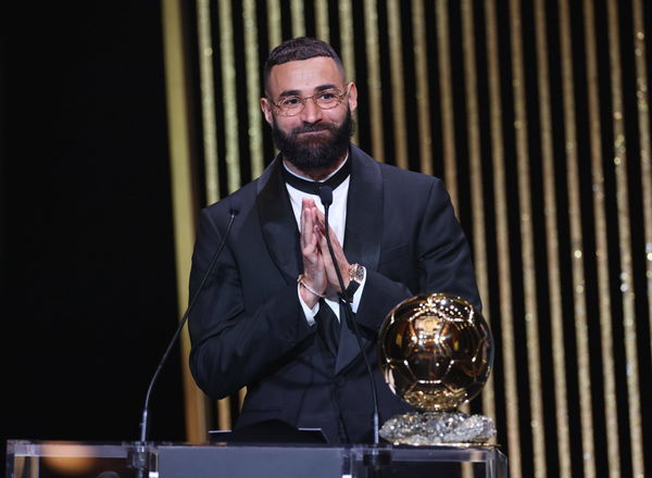 (221018) &#8212; PARIS, Oct. 18, 2022 &#8212; Real Madrid s French forward Karim Benzema reacts after receiving the men s Ballon d