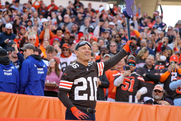 CLEVELAND, OH &#8211; OCTOBER 16: Cleveland Browns all-time great quarterback Bernie Kosar breaks a custom New England Patriot