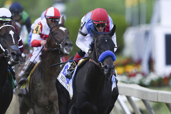 Horse Racing: Preakness, May 15, 2021; Baltimore, Maryland, USA; John Velazquez aboard Medina Spirit runs into turn one