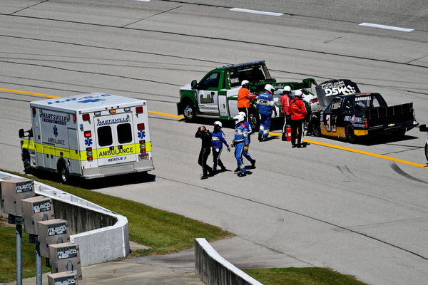 NASCAR, Motorsport, USA Gander Trucks at Darlington, Sep 6, 2020; Darlington, South Carolina, USA; Safety crews help NAS