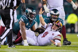 PHILADELPHIA, PA &#8211; NOVEMBER 14: Washington Commanders quarterback Taylor Heinicke (4) pleads with the referee after a l