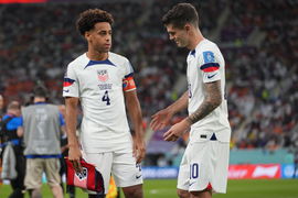 December 3, 2022, Al Rayyan, Qatar: AL RAYYAN, QATAR &#8211; DECEMBER 3: Tyler Adams 4 and Christian Pulisic 10 of the United