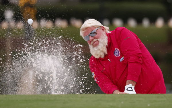 PGA, Golf Herren PNC Championship &#8211; First Round Dec 17, 2022; Orlando, Florida, USA; John Daly hits from a green side b