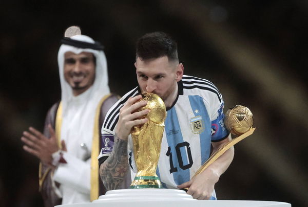 Lionel Messi of Argentina kisses the World Cup trophy the final of the FIFA World Cup, WM, Weltmeisterschaft, Fussball s