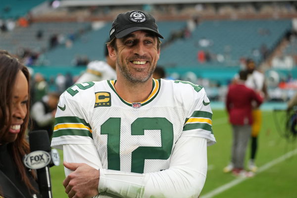 MIAMI GARDENS, FL &#8211; DECEMBER 25: Green Bay Packers quarterback Aaron Rodgers (12) smiles father camera following the ga