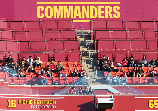 LANDOVER, MD &#8211; JANUARY 01: Washington Commanders stands with a few fans during the Cleveland Browns game versus the Wash