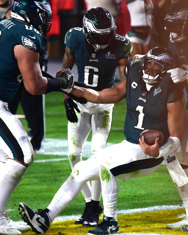 February 12, 2023, PHOENIX, ARIZONA, USA: Philadelphia Eagles quarterback JALEN HURTS scores on a two point conversion t