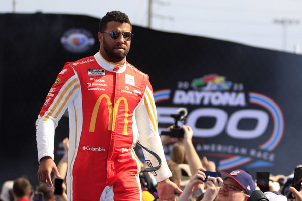 DAYTONA, FL &#8211; FEBRUARY 19: Bubba Wallace ( 23 23XI Racing McDonald s Toyota) shakes hands with fans during driver introd