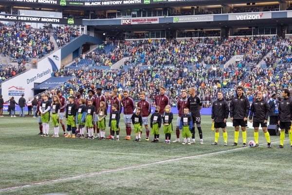 February 26, 2023, Seattle, Washington, USA: Colorado Rapid players line up with kids for the start of the game and the