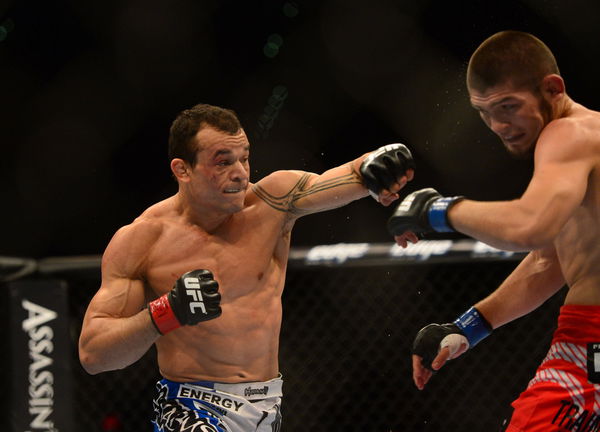 MMA: UFC 148-Tibau vs Nurmagomedov Jul. 7, 2012; Las Vegas, NV, USA; UFC fighter Gleison Tibau (left) swings at Khabib N