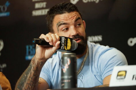 Mike Perry talking on mic at a BKFC conference
