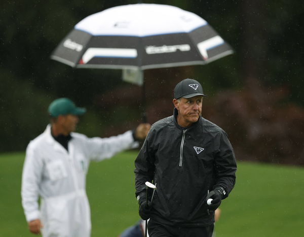 Phil Mickelson walks to the 9th green during the third round at the 87th Masters tournament at Augusta National Golf Clu