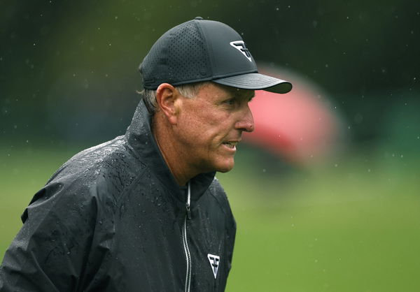 Phil Mickelson walks to the 9th green during the third round at the 87th Masters tournament at Augusta National Golf Clu