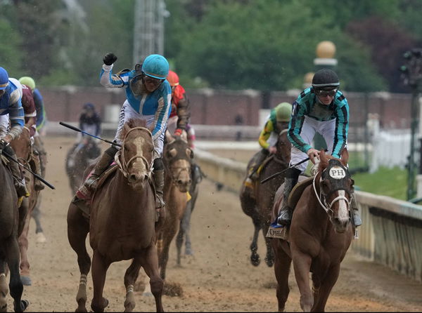 Mage with Javier Castellano aboard (L) wins the 149th running of the Kentucky Derby ahead of Two Phil s with Jareth Love