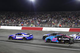 NORTH WILKESBORO, NC &#8211; MAY 21: Kyle Larson ( 5 Hendrick Motorsports HendrickCars.com Chevrolet) leads Bubba Wallace ( 23