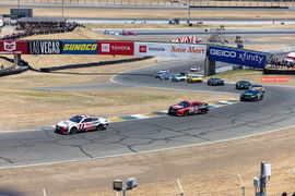 SONOMA, CA &#8211; JUNE 11: Denny Hamlin ( 11 Joe Gibbs Racing Clips Haircuts Toyota) leads the pack early during the NASCAR,