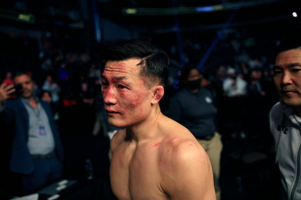 Syndication: Florida Times-Union Chan Sung Jung, aka The Korean Zombie, leaves the arena after being KOed/TKOed in the f