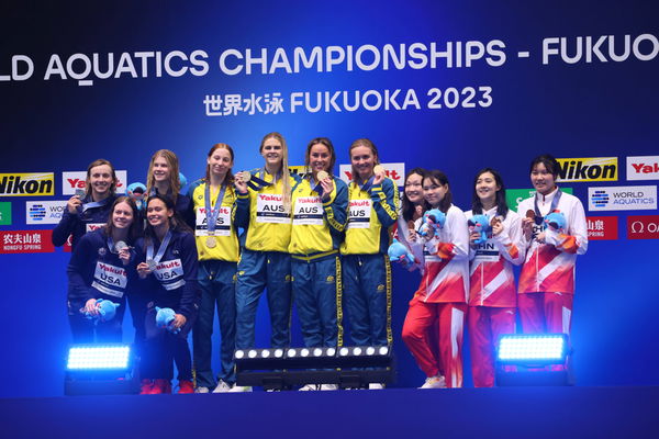 (L-R) USA team (USA), Australia team (AUS), China team (CHN) after the Women 4x200m freestyle relay final swimming event