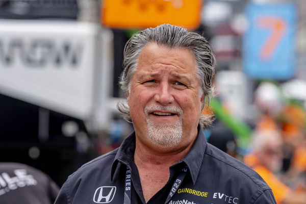 August 27, 2023, Madison, IL, USA: Team Owner, MICHAEL ANDRETTI, watches his team work on their race car before the Bomm