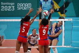 SANTIAGO, CHILE OCT 26: Ivania Ortiz de Puerto Rico juega el balon contra Cuba por la clasificacion 7mo &#8211; 8vo durante lo