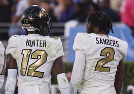 October 28, 2023, Pasadena, California, USA: Buffaloes ATH Travis Hunter and QB Shadeur Sanders have a side bar while on