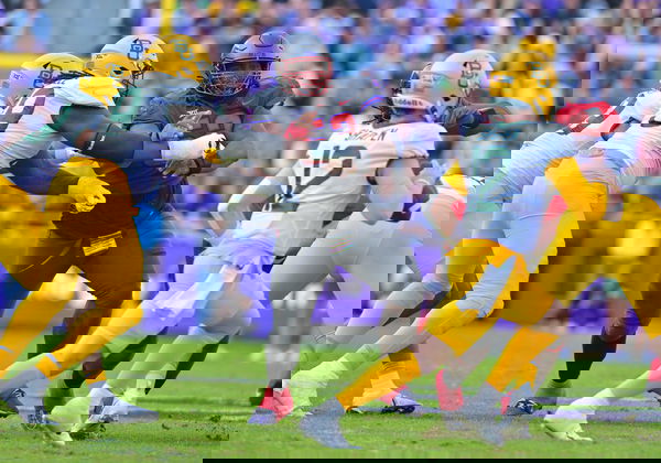 November 18 2023: TCU Horned Frogs defensive lineman Damonic Williams (52) fights through a block from Baylor Bears offe